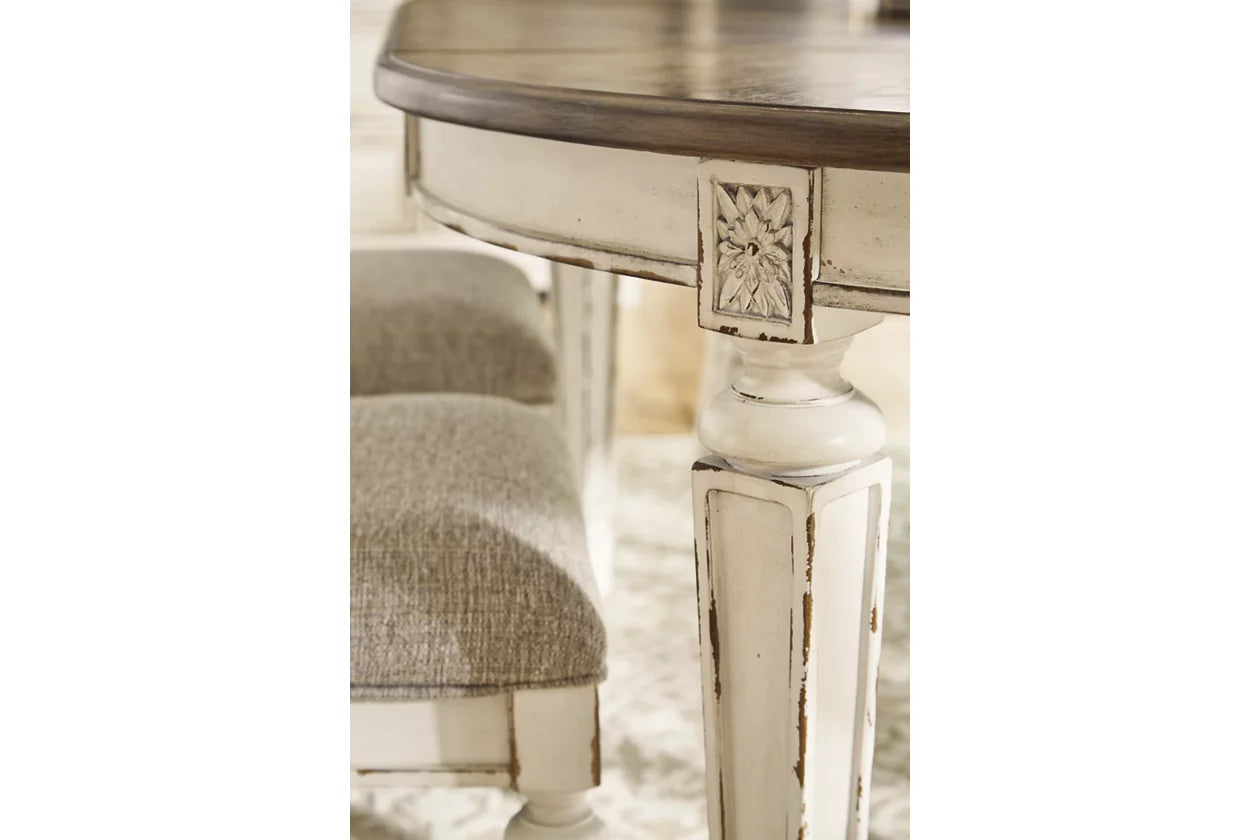 Realyn Chipped White Extendable Round/Oval Ribbon Dining Set