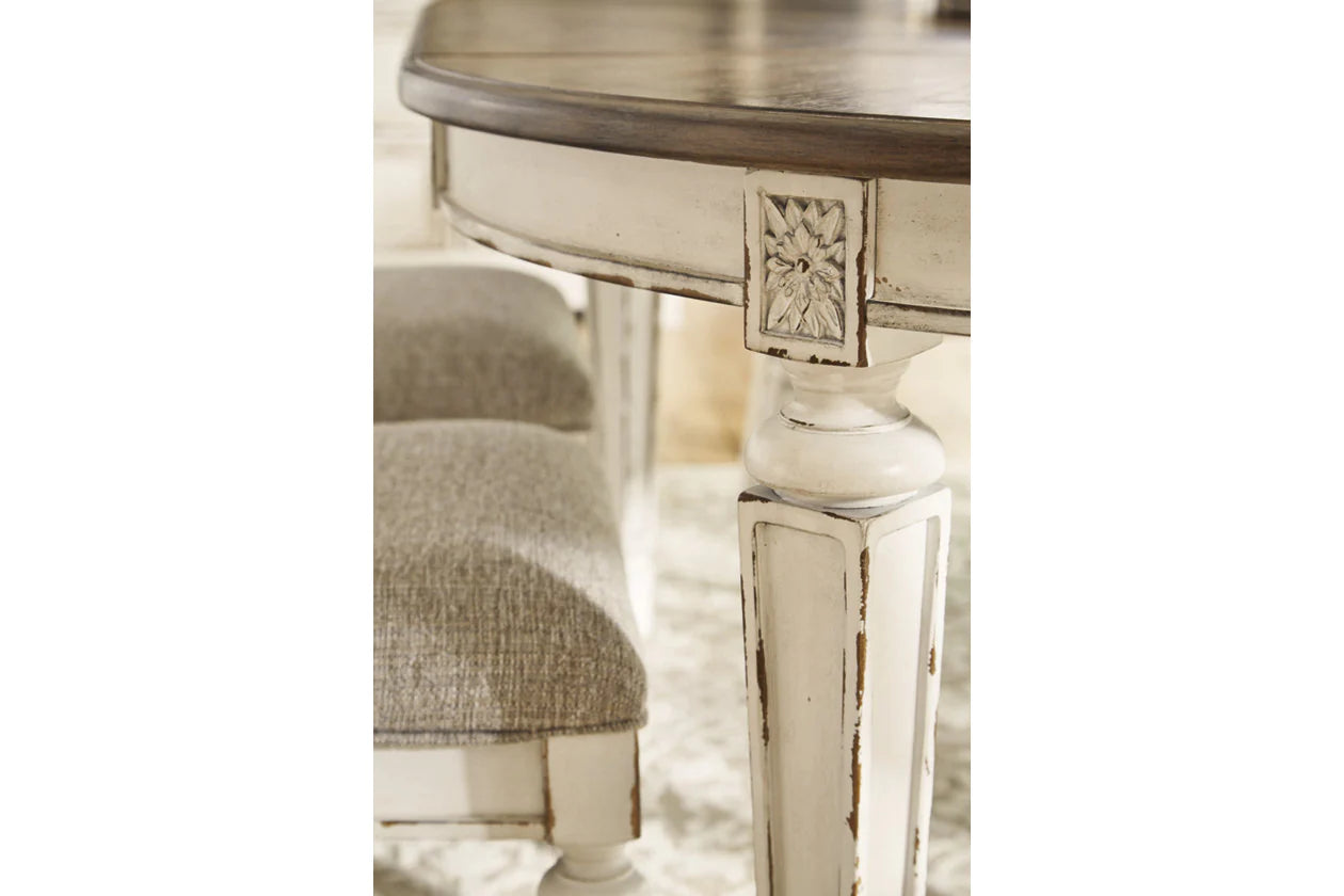Realyn Chipped White Oval Extendable Dining Table