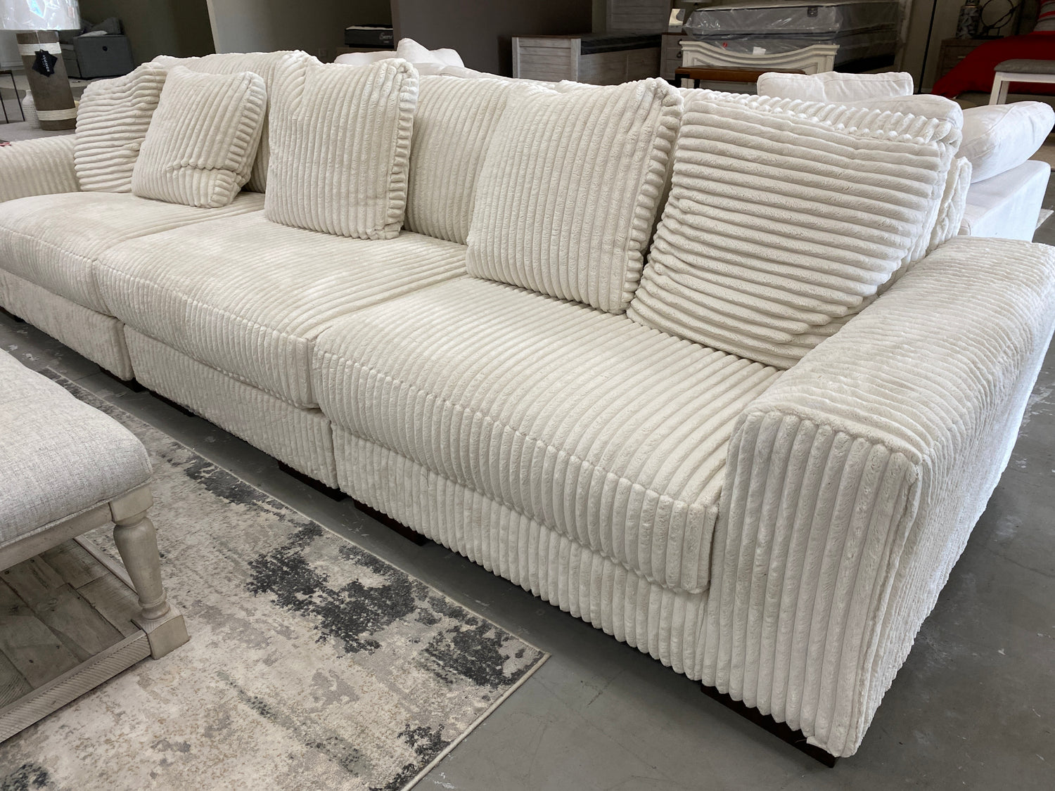 Lindyn Ivory 3-Piece Sectional Sofa