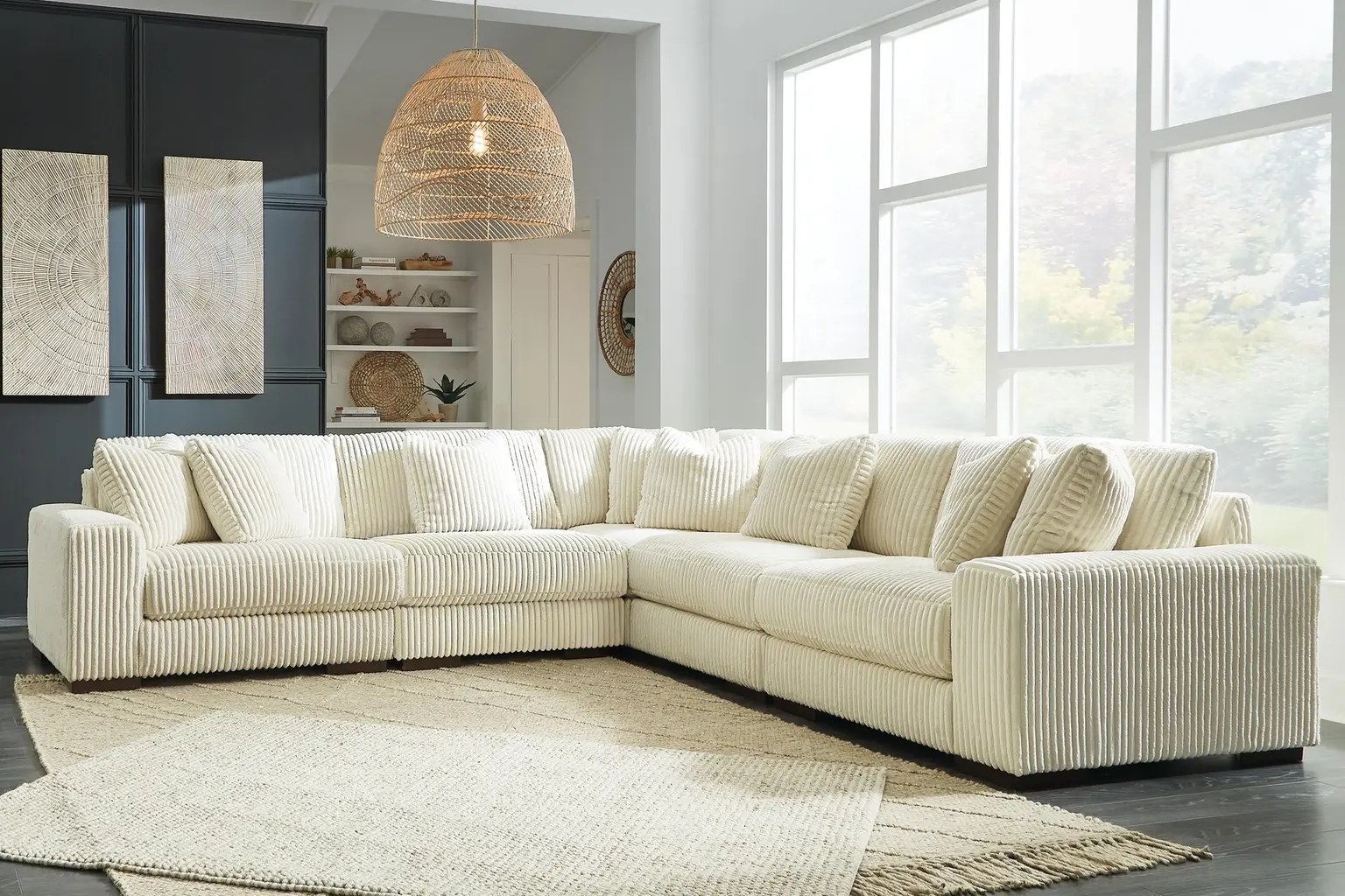 Ashley Lindyn ivory modular sectional in a bright, warm living room